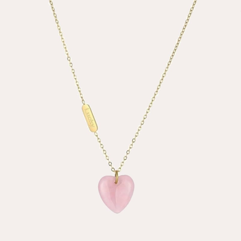 Colgante de corazon de melocontón de cuarzo