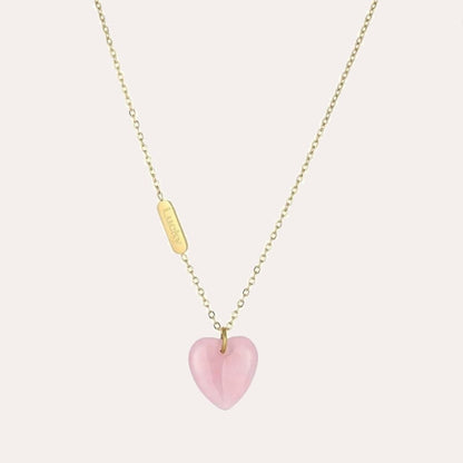 Colgante de corazon de melocontón de cuarzo