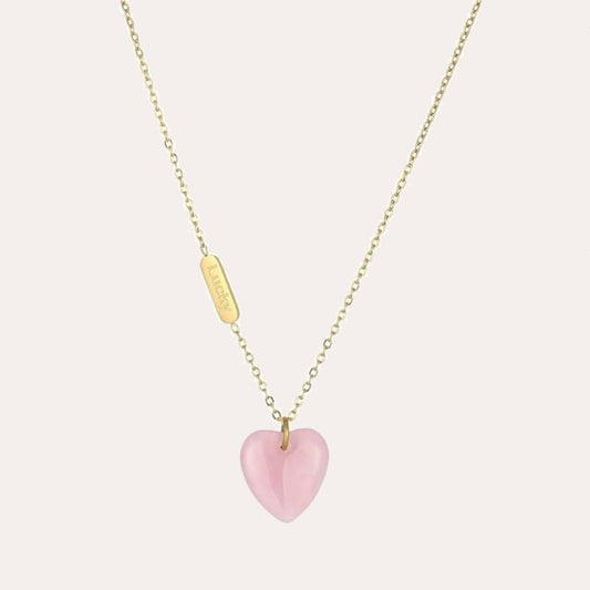 Colgante de corazon de melocontón de cuarzo